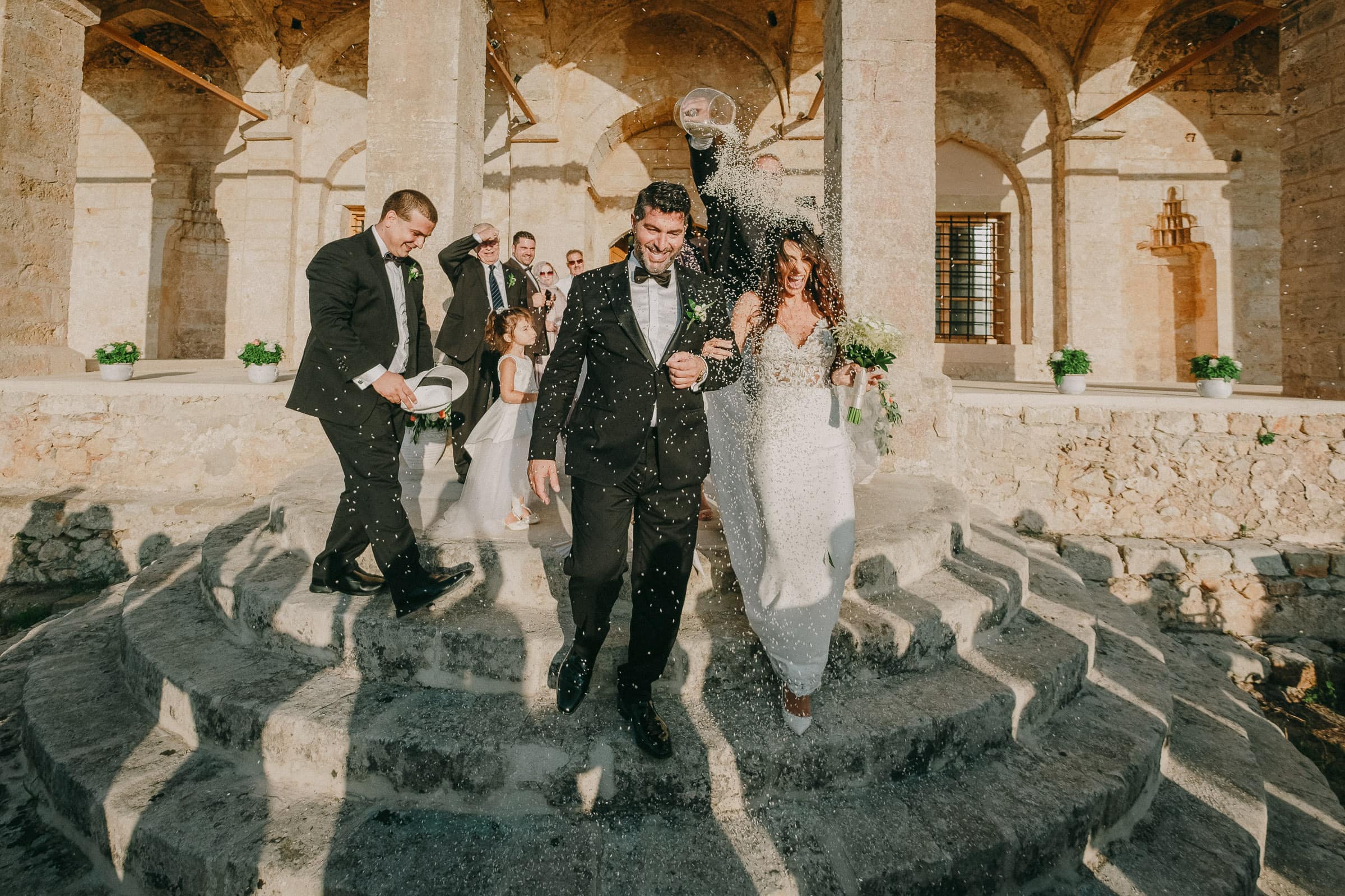 Charles and Miglena leaving the church after their wedding ceremony at Niokastro