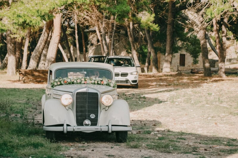 Vintage wedding car at Niokastro Castle in Pylos