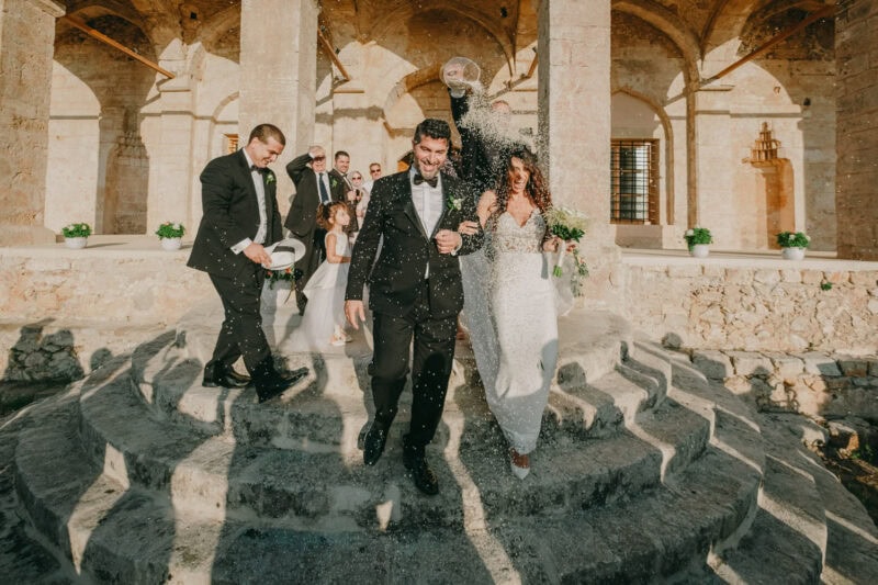 Charles and Miglena leaving the church after their wedding ceremony at Niokastro