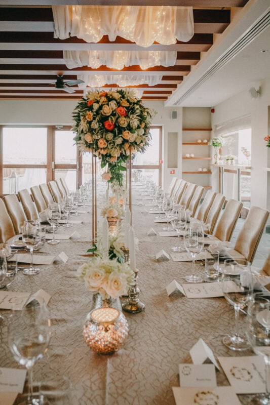 Elegant Costa Navarino wedding reception with floral table decor