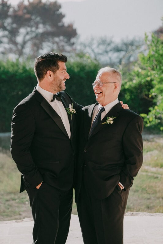 Groom with father before the wedding ceremony at Niokastro