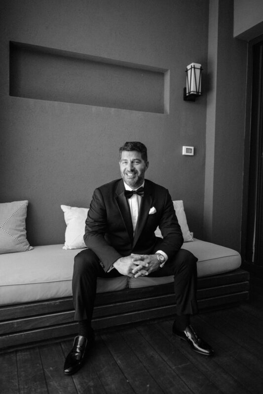 Black and white groom portrait before the wedding ceremony