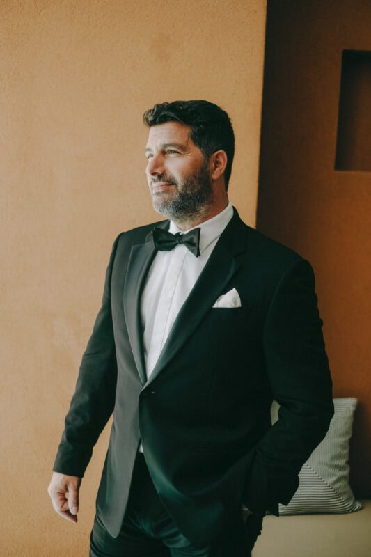Elegant groom portrait before his Costa Navarino wedding