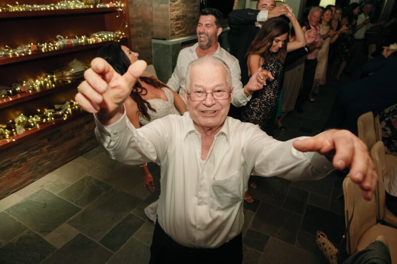 Wedding guest dancing during the evening reception