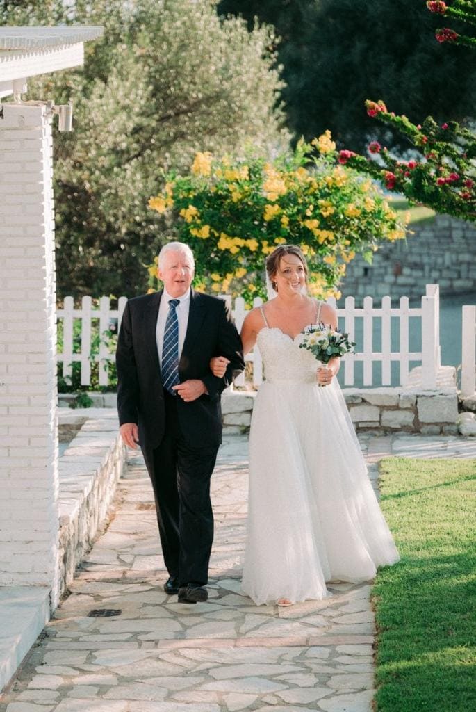 Bride arriving for her wedding at Akrotiri Venue
