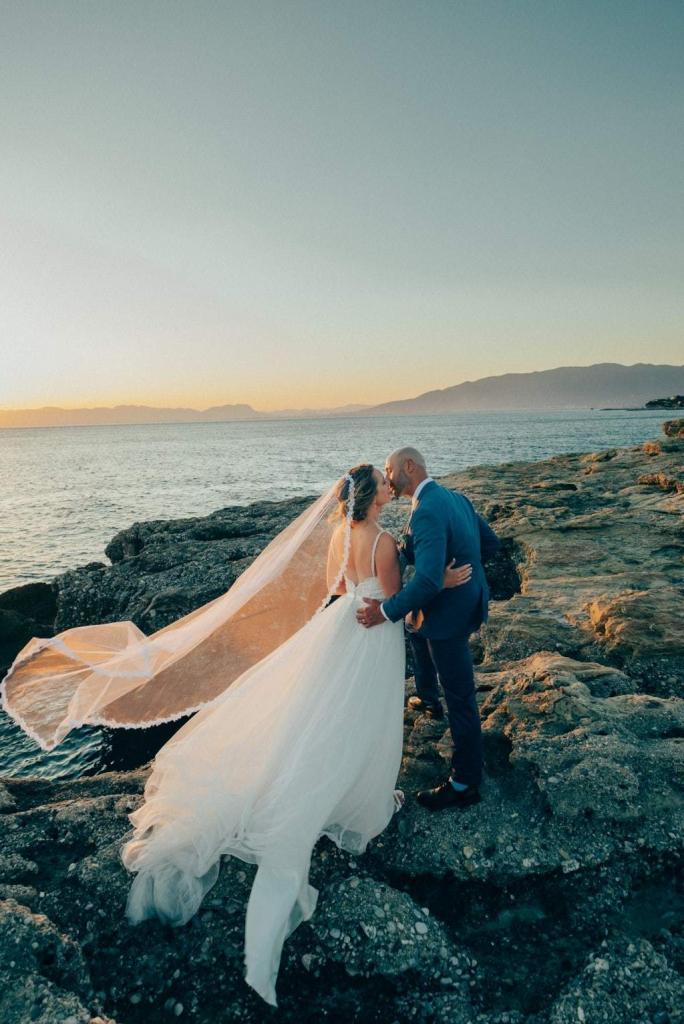 Bride and groom at sunset on the Messinian coast