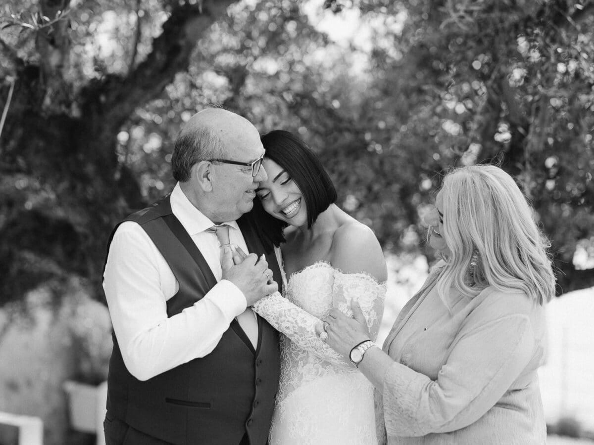 Bride with her family before the wedding ceremony