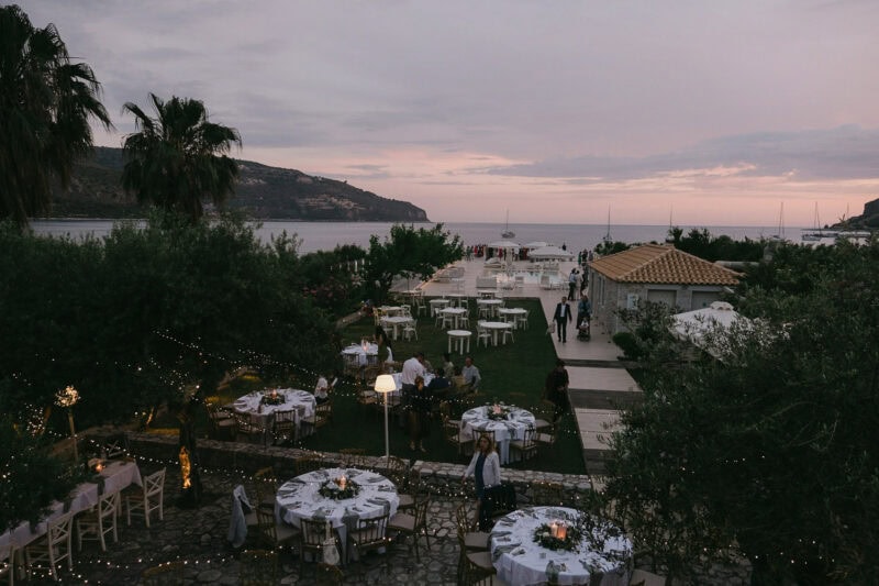 Wedding reception overlooking the sea at sunset in Mani