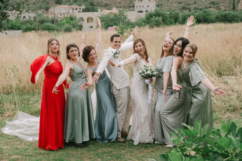 Bride celebrating with her bridesmaids in Mani